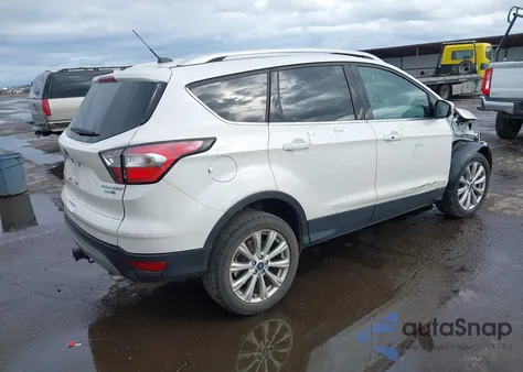 2017 Ford Escape Titanium z USA, uszkodzony, nr VIN 1FMCU9J94HUE48485